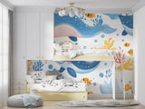 Ocean themed wallpaper creating calm atmosphere in baby room