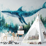 Whale wall mural brightening a child's bedroom with magical watercolor effects