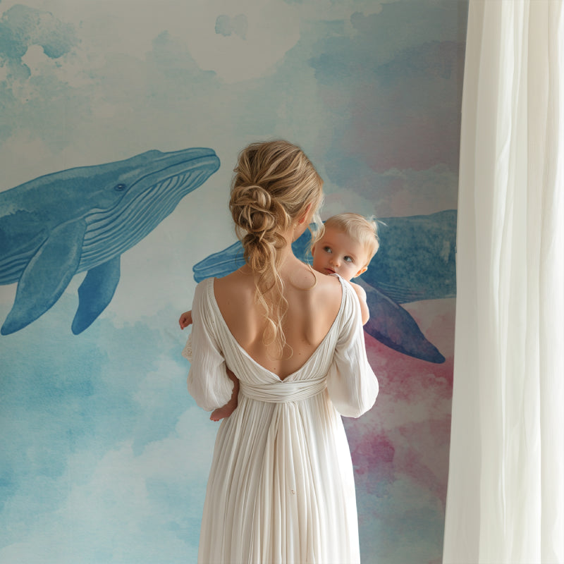 Whale wallpaper mural creating a peaceful atmosphere in a children's bedroom
