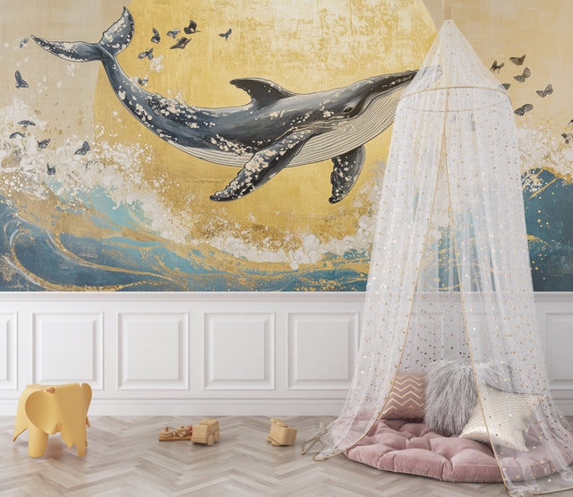 Marine wallpaper with whale and butterflies styled in modern nursery with natural light