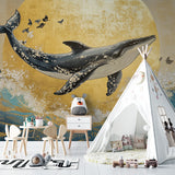 Whale wallpaper design bringing golden glow to reading nook