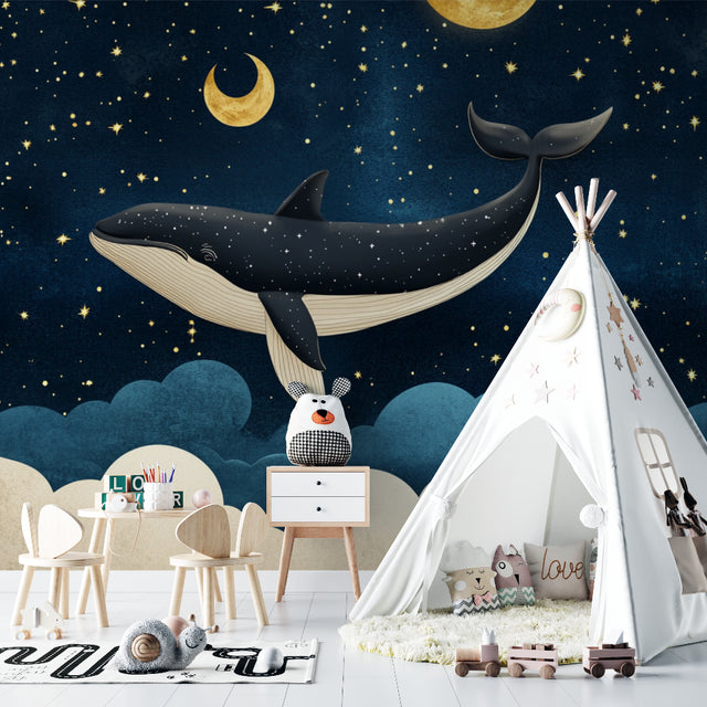 Marine whale wallpaper creating magical atmosphere in modern nursery with soft lighting