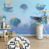 Whale wallpaper bringing ocean magic to a cozy children's bedroom with soft blue tones