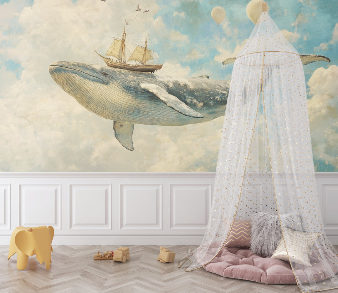 Nautical wallpaper adding whimsy to a playroom with floating whale and ship design
