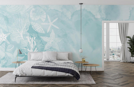 Marine life wallpaper creating a peaceful atmosphere in a modern coastal bedroom with natural light