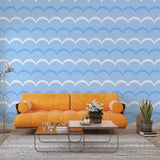 Marine pattern wallpaper with scalloped waves creating a calming atmosphere in a modern coastal bedroom