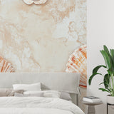 Terracotta seashell wallpaper adding warmth to home office space