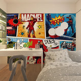 Children's bedroom with Marvel-themed wall art and desk.