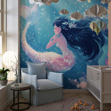 Mermaid wall design bringing ocean magic to a modern nursery setting