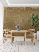 Metallic bronze wallpaper adding warmth to home office space