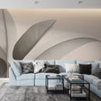 Minimalist leaf wallpaper creating a peaceful atmosphere in a modern living room with beige abstract pattern