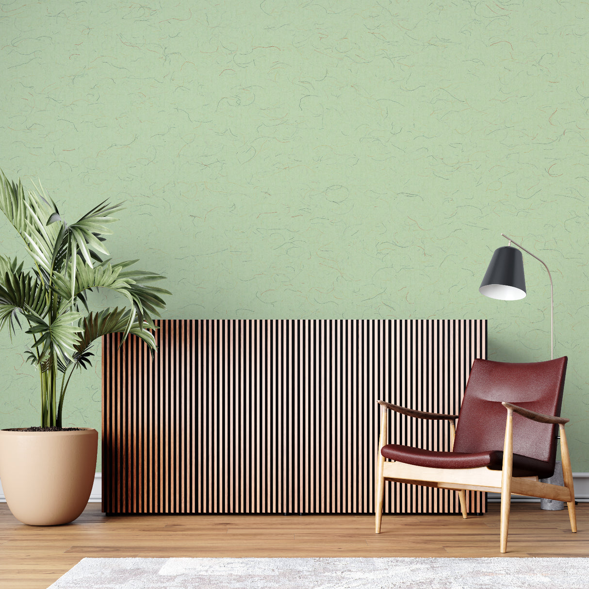 Green textured wall mural in dining room showing the light-catching surface effects