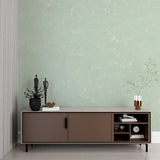 Minimalist mint green wall mural in a calming bedroom setting