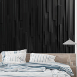 3D black geometric wall mural in a minimalist office space