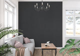 Contemporary grey wallpaper adding sophistication to a master bedroom