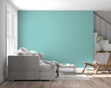 Modern green wallpaper creating calm atmosphere in nursery room