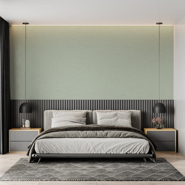 Sage green textured wallpaper in a modern living room with natural light streaming through windows