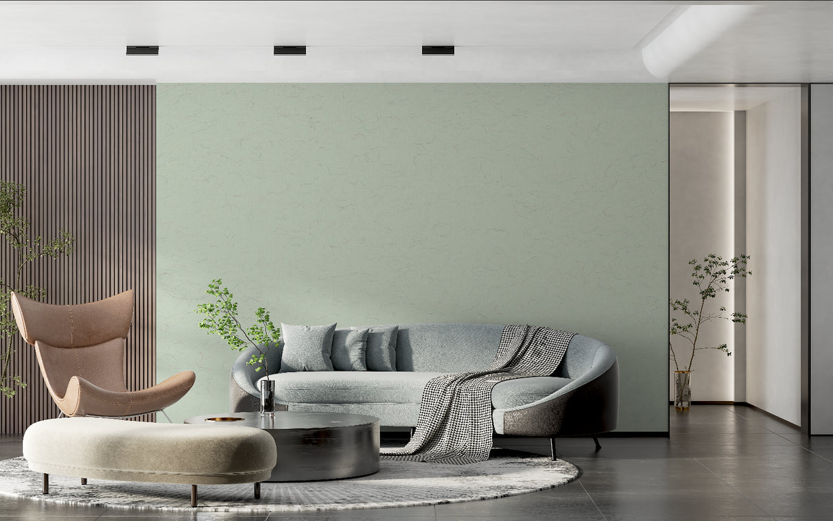 Minimalist bedroom featuring sage green wall mural creating a peaceful atmosphere
