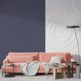 Modern grey wallpaper installation in a dining room with pendant lights