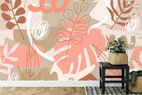 Bedroom featuring abstract Monstera wallpaper mural showing coral and beige botanical patterns