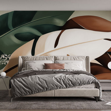 Modern Monstera leaf wallpaper in cozy living room setting, earth tones creating warm atmosphere against neutral furniture