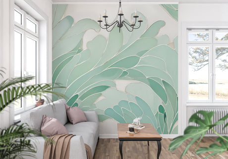 Modern living room with Monstera leaf wallpaper in mint green, showing flowing abstract botanical pattern