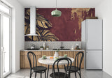 Luxury Monstera leaf wallpaper in modern dining room, golden leaves catching evening light against burgundy background