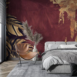 Golden Monstera wallpaper creating warm atmosphere in master bedroom with soft lighting