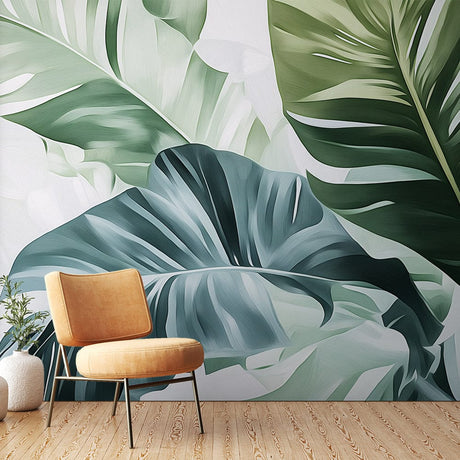 Modern living room with Monstera leaf wallpaper creating a fresh tropical atmosphere against neutral furniture