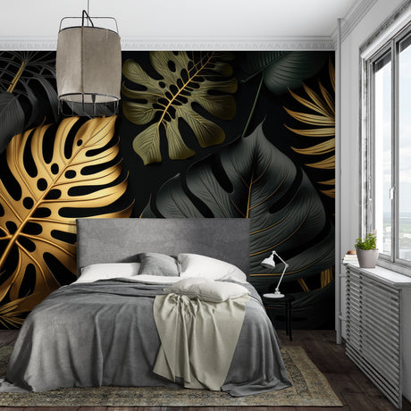 Luxury Black and Gold Monstera Leaf Wallpaper in modern living room with grey sofa and brass accents