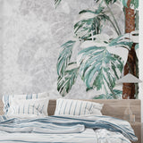 Modern living room with Monstera marble wallpaper creating a fresh botanical atmosphere