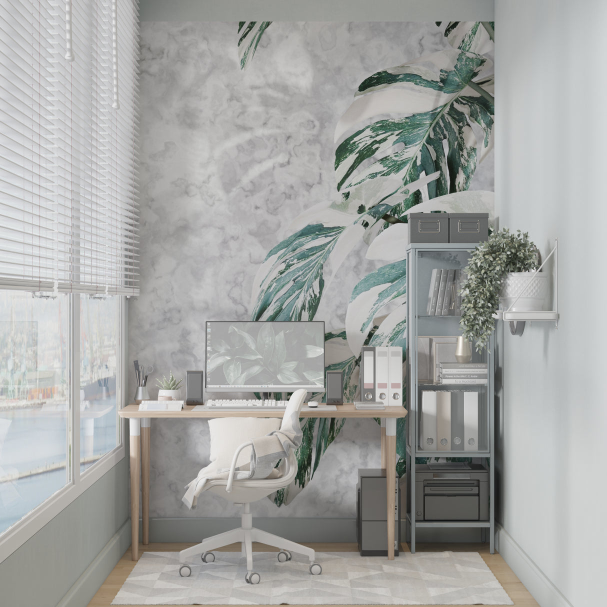 Home office featuring elegant Monstera leaf wallpaper with marble effect backdrop