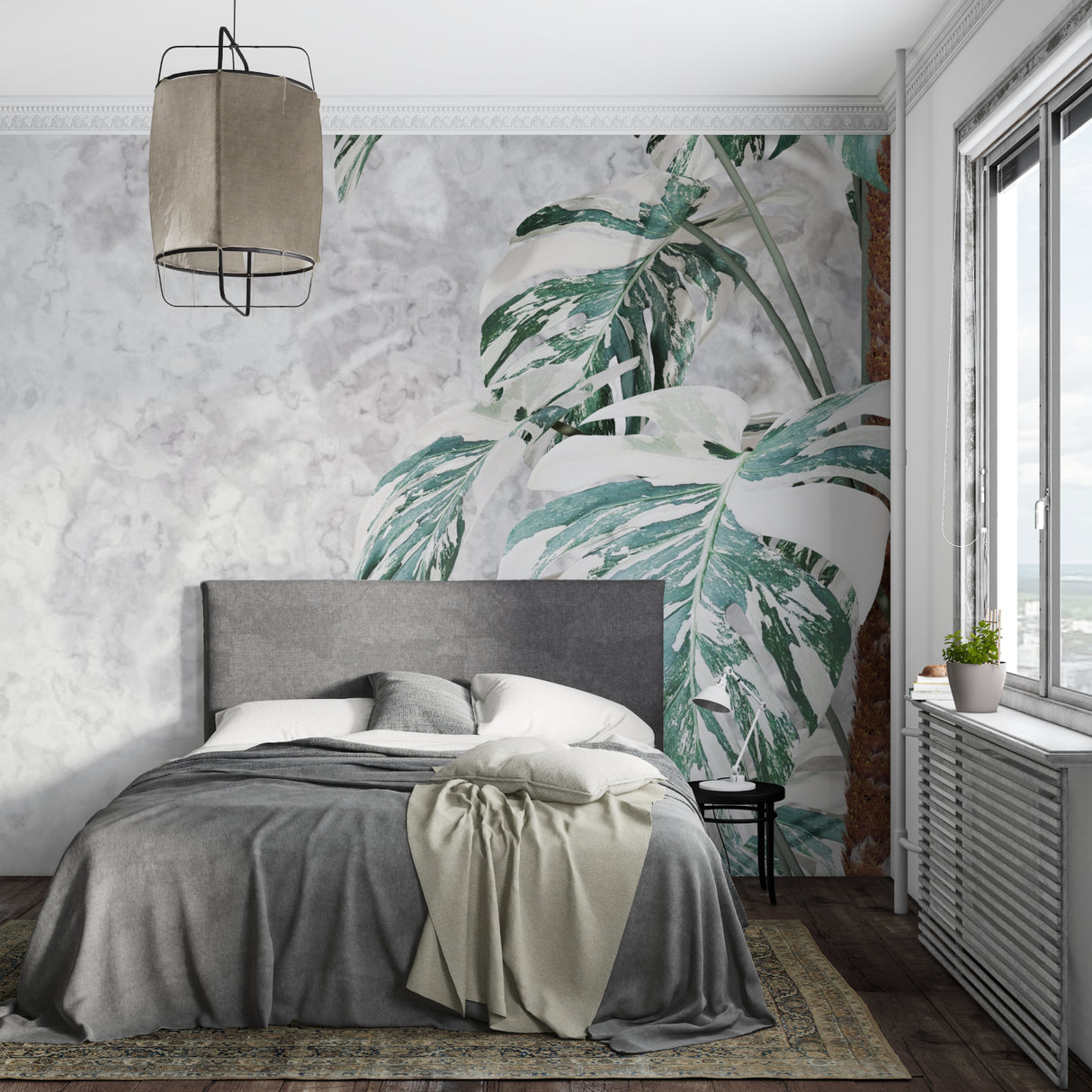 Bedroom wall with tropical Monstera leaf pattern blending marble and botanicals