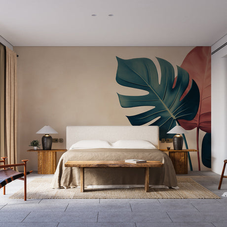 Modern Monstera leaf wallpaper creating a bold statement wall in a bright dining room with minimal furniture