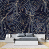 Luxury entryway showcasing Navy Blue Monstera Leaf Mural with gold details