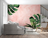 Dining room transformed with tropical Monstera wallpaper in pink and green