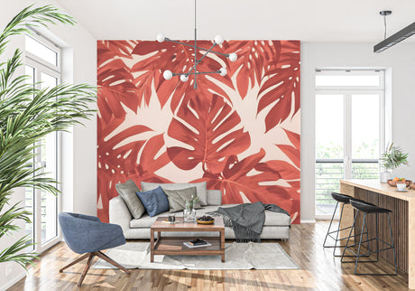 Modern living room with Monstera leaf wallpaper in terracotta creating a warm, inviting atmosphere