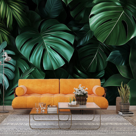 Monstera leaf wallpaper creating a bold statement in a modern living room with minimalist furniture