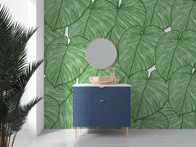 Modern living room with Monstera leaf wallpaper creating a fresh tropical atmosphere