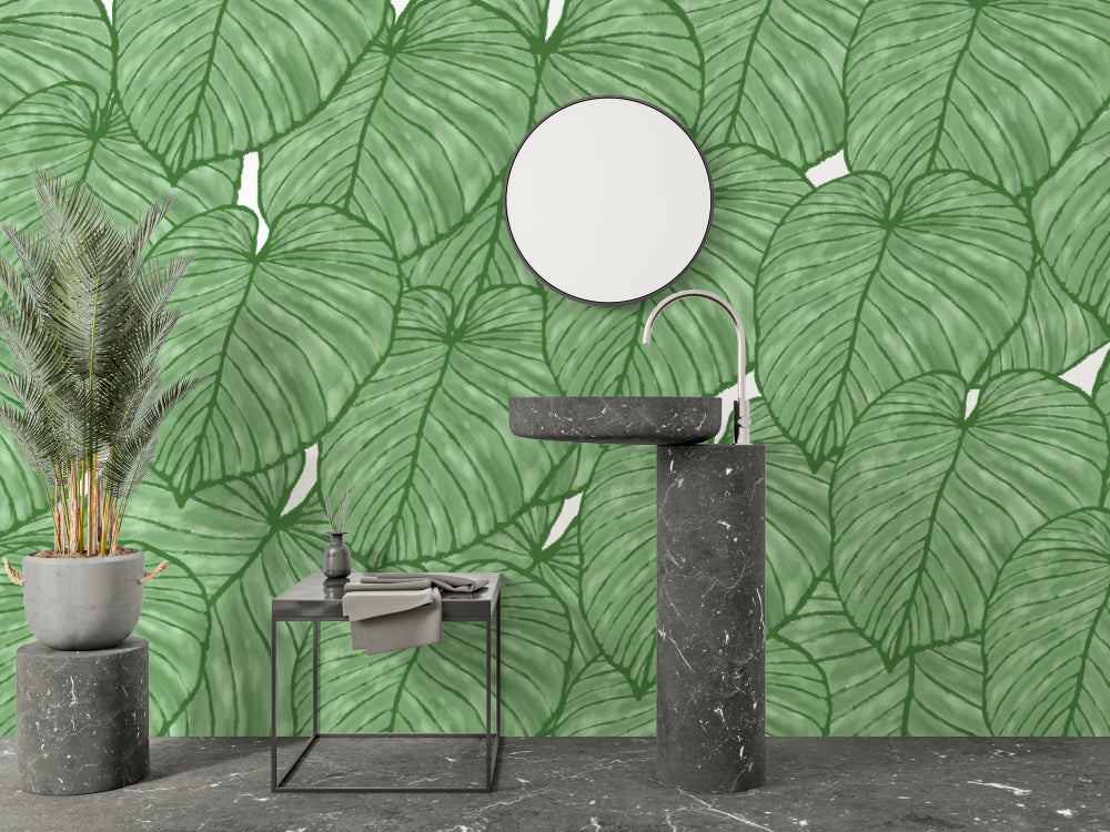Dining room with tropical Monstera leaf mural adding natural elegance
