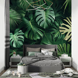 Large-scale monstera leaves pattern enhancing hallway walls