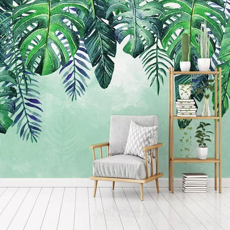 Tropical monstera wallpaper brightening up a home office with natural light