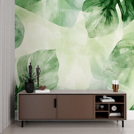 Monstera leaf wallpaper in modern living room showing green watercolor design