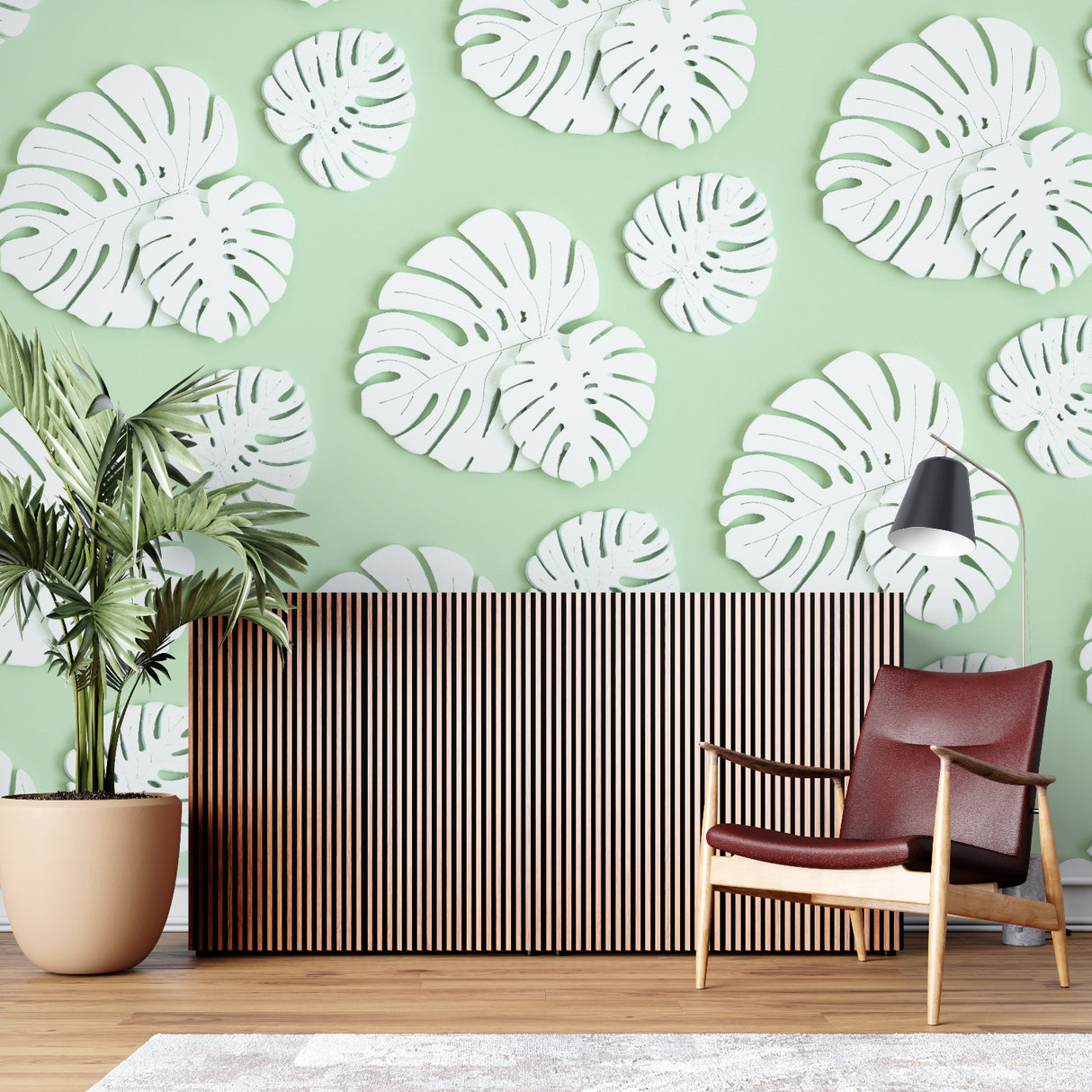 Home office with white Monstera leaf wallpaper adding a clean, professional touch