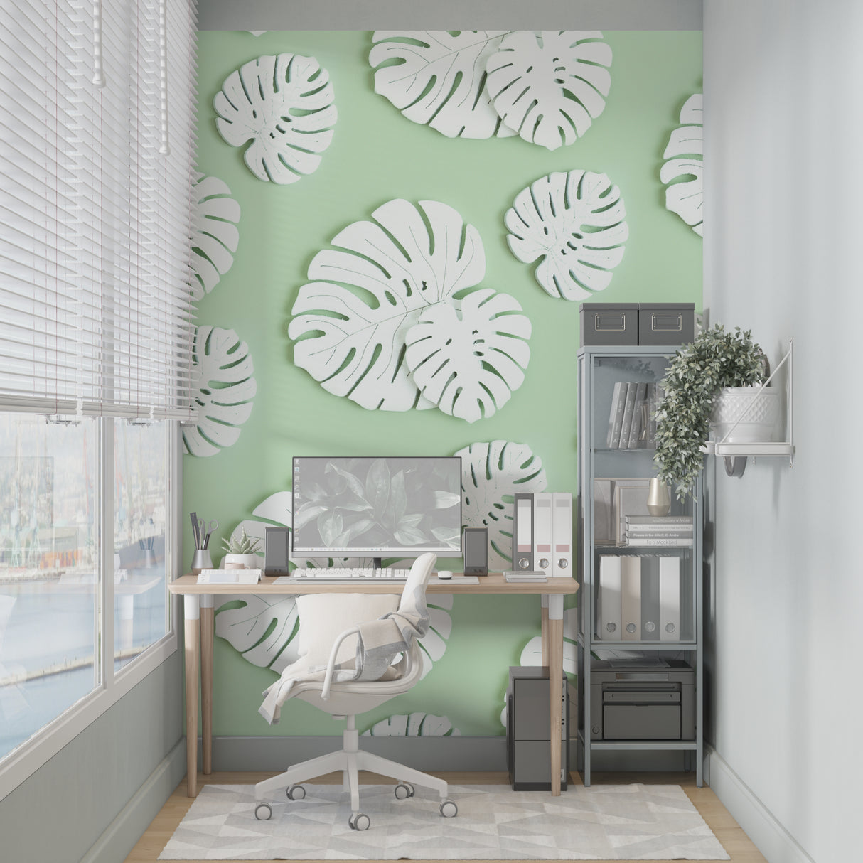 Dining area showcasing white Monstera leaf pattern on mint green background