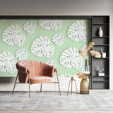 Bathroom featuring modern Monstera leaf wallpaper in fresh mint and white tones