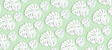 Design file showing white Monstera leaf pattern on mint green background