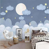 Night sky mural wallpaper creating magic in a kids bedroom with twinkling stars effect
