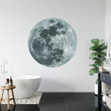 Grey moon wallpaper transforms home office into calming workspace