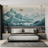 Mountain adventure wallpaper styled in modern bedroom, showing vintage airplane soaring over snowy peaks